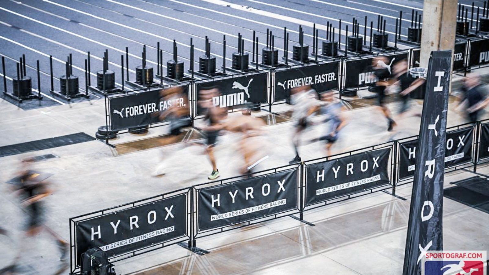 Athletes on the run course at a HYROX race
