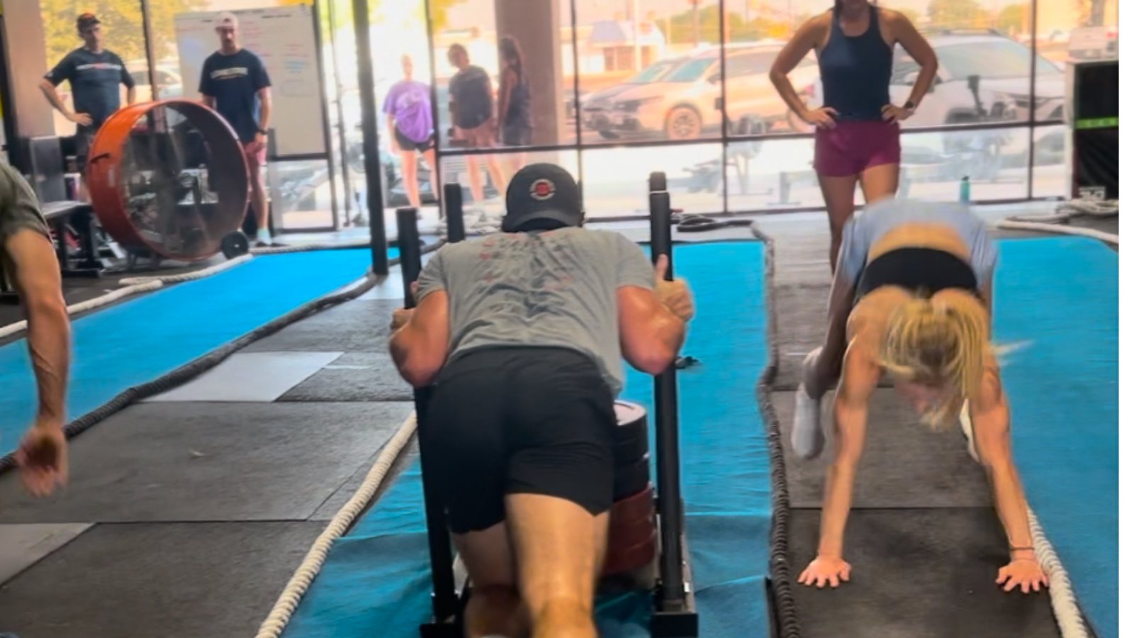 Sled push practice on the turf at FTX Fort Worth