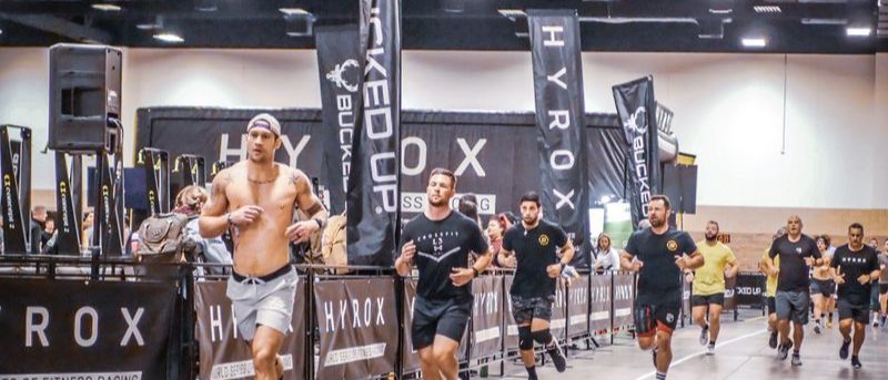 Athletes running the race-floor lap, HYROX Fort Worth